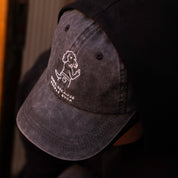 Musta denimlippis - Logo "Dogs. Because People Suck" 